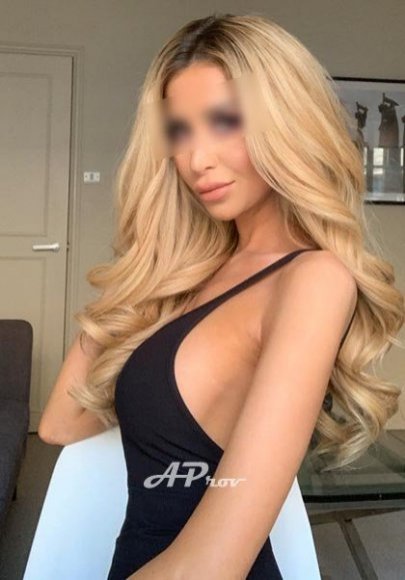 sexy blonde girl with big tits in mayfair
